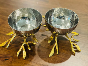 Silver bowls sitting on Twig gold legs