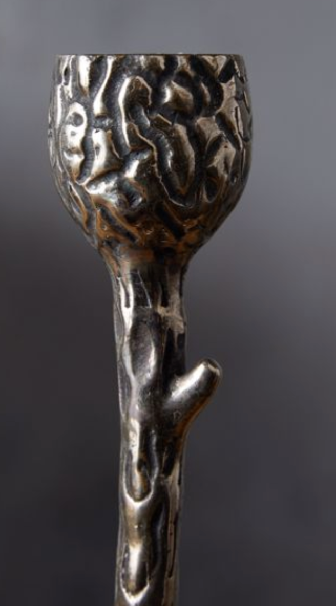 Sleek tree branch candle holder
