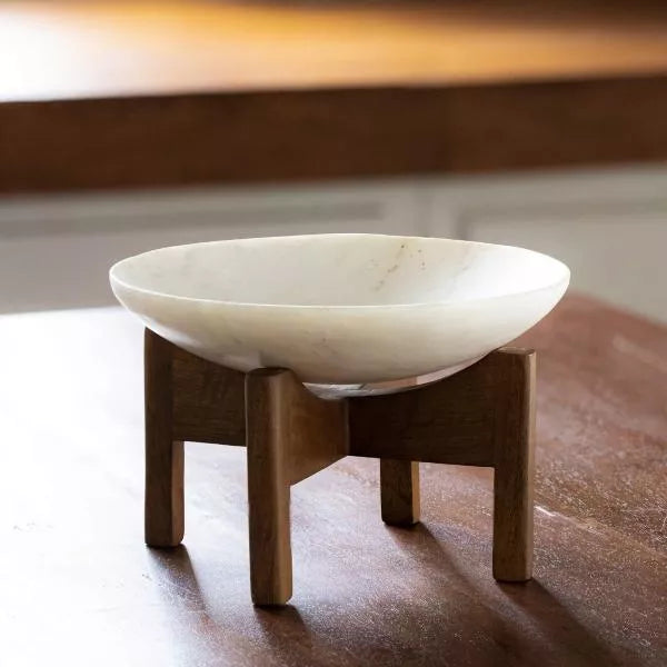 White marble bowl with wooden stand