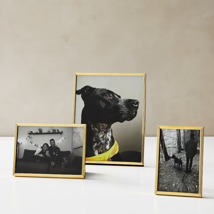 Stepped brass photo frames